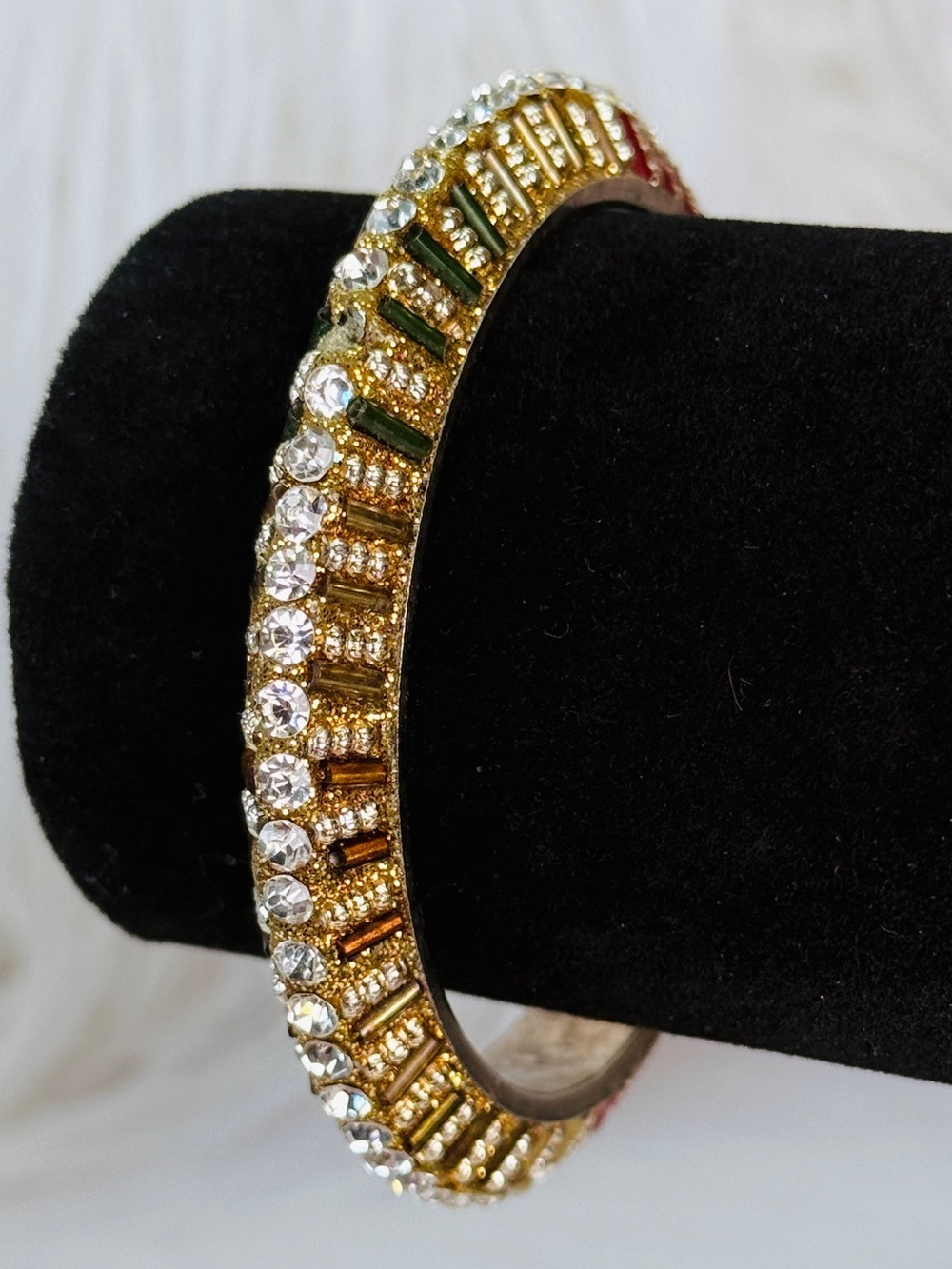 Vintage Goldtone red green, clear accent holiday bangle bracelet
